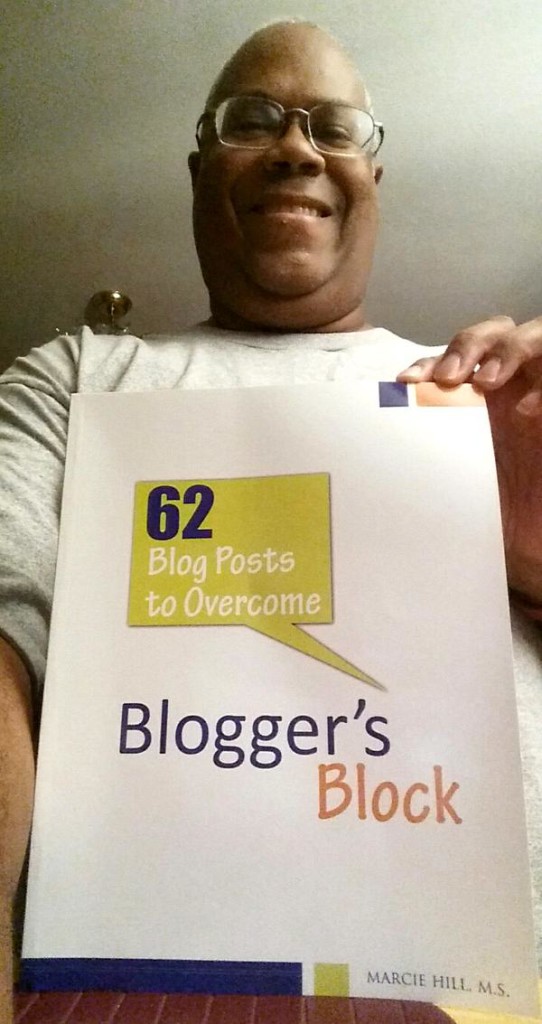 Mitch with Overcoming Blogger's Block Book