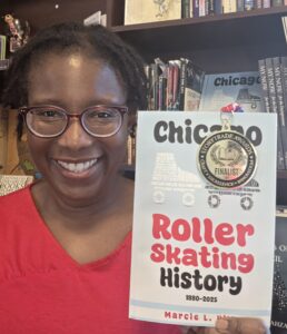 Author Marcie Hill holding her roller skating book with StoryTrade Book Awards badge.
